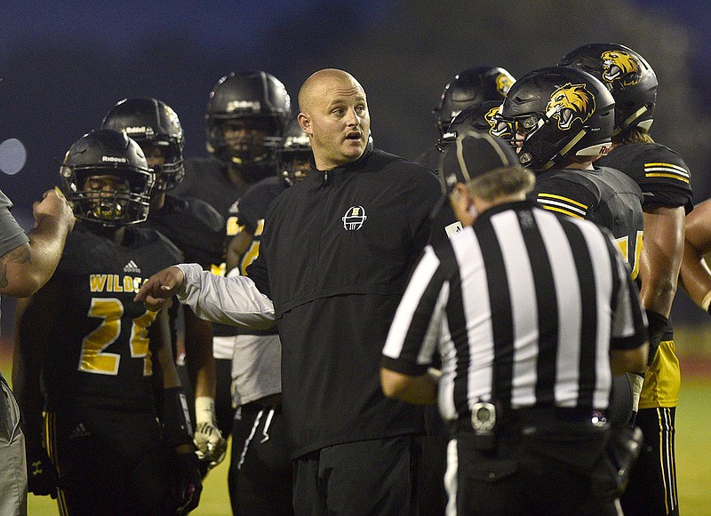 Staff file photo by Robin Rudd / Hixson football coach Josh Owensby and the Wildcats celebrated a win in their season opener Thursday night against visiting Signal Mountain.