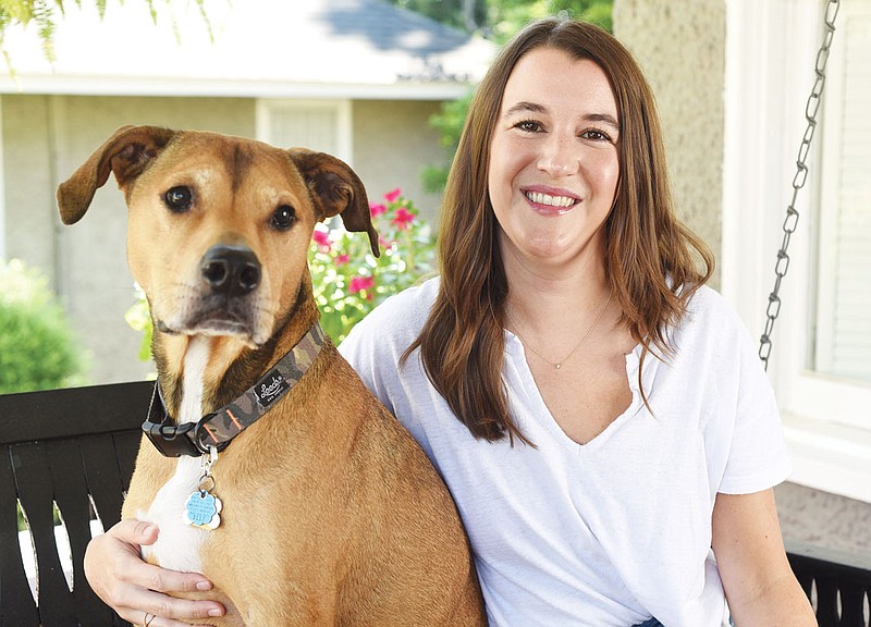 Staff photo by Matt Hamilton / Natalie Martin and her dog Junior at her home.