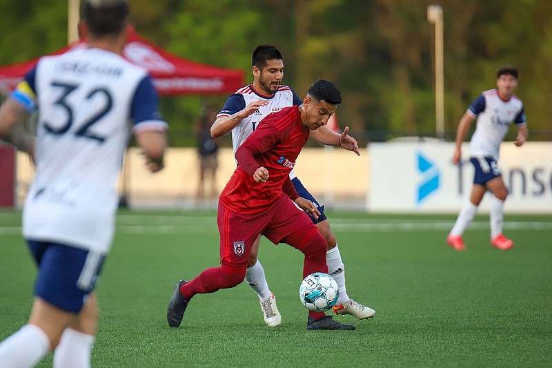 Staff file photo by Olivia Ross / Jimmie Villalobos, center, scored the go-ahead goal Saturday night as the Chattanooga Red Wolves beat South Georgia Tormenta FC 2-1.