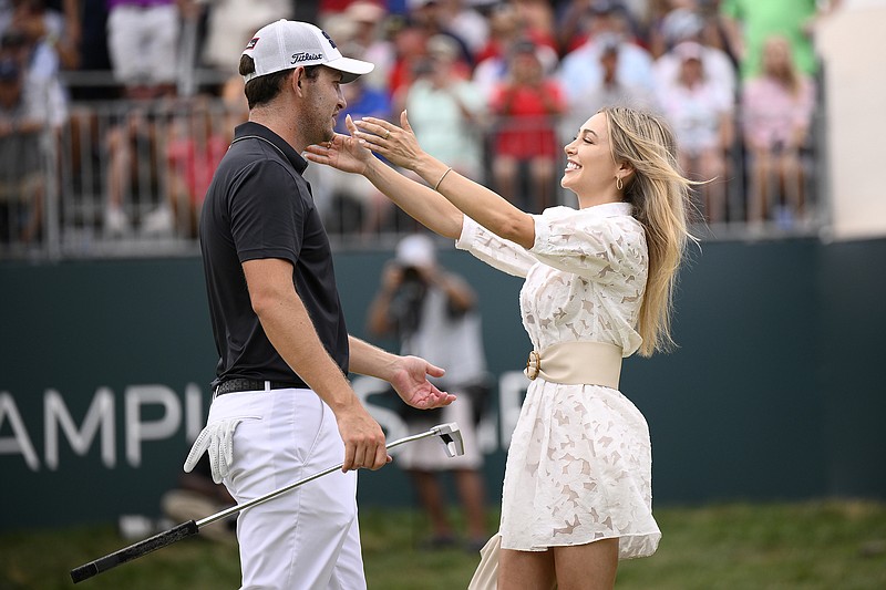 AP photo by Nick Wass / Patrick Cantlay celebrates with his girlfriend, Nikki Guidish, after winning the PGA Tour’s BMW Championship on Sunday at Delaware’s Wilmington Country Club.