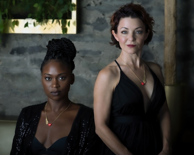 Contributed photo by David Tedder /  Model Deshonte Jackson and Chattanooga creative Shanna Forrestall wear one half of a two-piece special edition necklace designed to support women and girls.