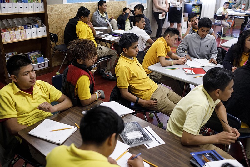 Staff photo by Doug Strickland / 
Students listen to assignment instructions during a NewComer Academy class at Howard School on Tuesday, April 23, 2019, in Chattanooga, Tenn. Howard has launched NewComer Academy to help acclimate new Hispanic students, who comprised nearly 60% of the school's 2019 freshmen class.