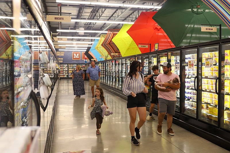 Staff photo by Olivia Ross  / Families check out the new East Ridge Food City on June 21, 2022. The store's official grand opening will be on Wednesday, June 22.