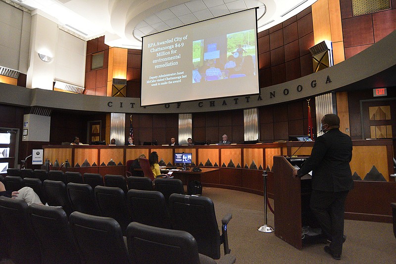 Staff photo by Matt Hamilton / Jermaine Freeman, right, with the City of Chattanooga, gives a presentation during a Chattanooga-Hamilton County Sports Authority board meeting at the Chattanooga City Council assembly room on Tuesday, August 30, 2022.