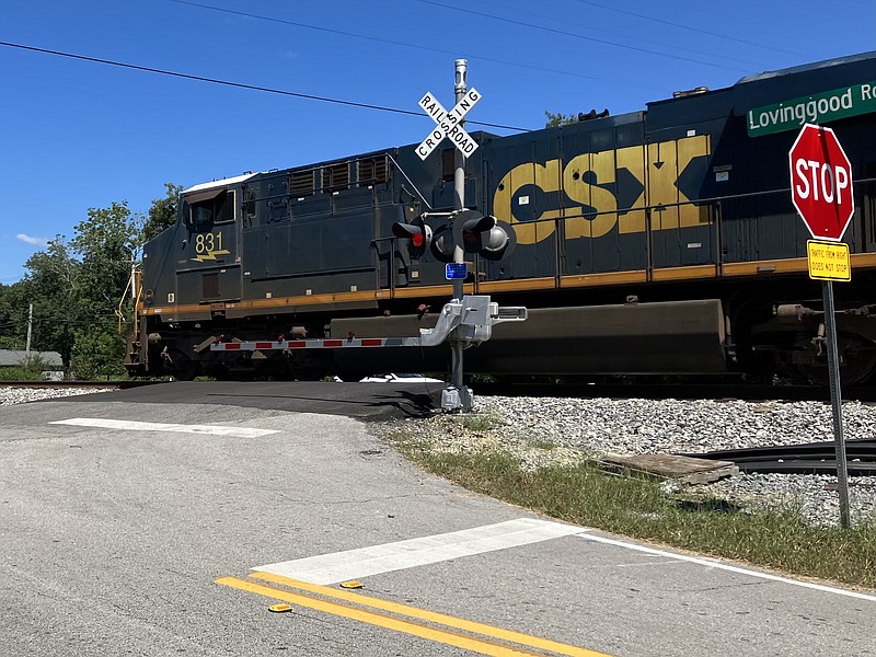 Staff Photo by Andrew Wilkins / At the Lovinggood Road crossing, a CSX train chugs down the tracks north of Ringgold on its way to Chattanooga on Thursday, Sept. 1, 2022. Catoosa County officials say they are frustrated by a lack of action by CSX that’s forced Catoosa County Public Schools to suspend a school bus route.