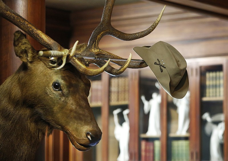 AP file photo by Kathy Willens / Theodore Roosevelt’s Rough Rider hat hangs on the horns of an elk head, shot by the nation’s 26th president, in the trophy room at Sagamore Hill, Roosevelt’s summer White House and his home in Oyster Bay, N.Y. Roosevelt helped lay the groundwork for conservation principles that still guide sportsmen today.
