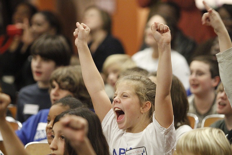 Staff file photo / A fourth-grader screams along with other students at Normal Park Middle School in 2011 over rising test scores.