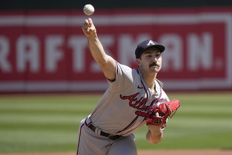 AP photo by Tony Avelar / Atlanta Braves starter Spencer Strider pitches against the host Oakland Athletics on Wednesday afternoon.