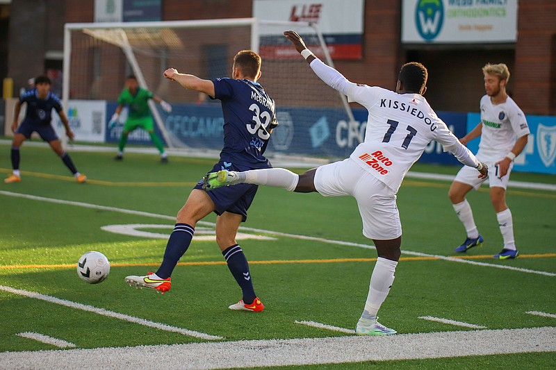 Staff file photo by Olivia Ross / Chattanooga FC’s Alex McGrath, left, scored during Wednesday night’s 2-1 road win against NISA foe Albion San Diego.