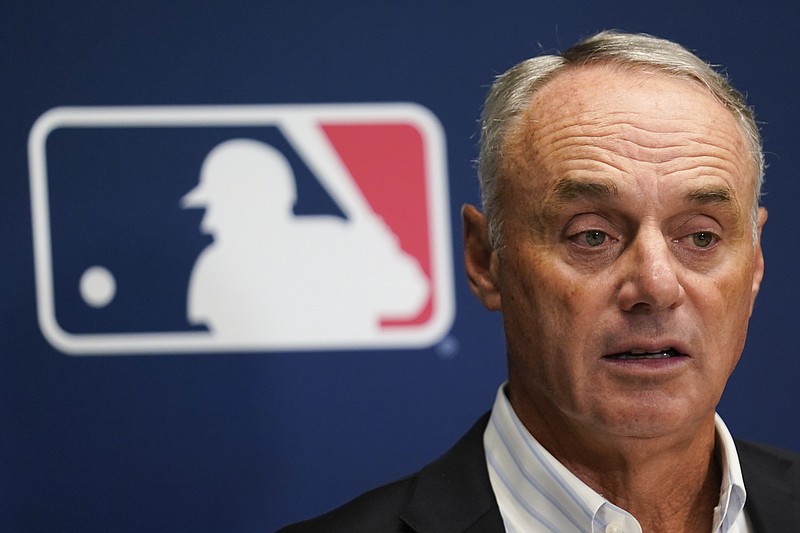 AP photo by Seth Wenig / Commissioner Rob Manfred speaks to reporters in June after an owners’ meeting at MLB headquarters in New York.