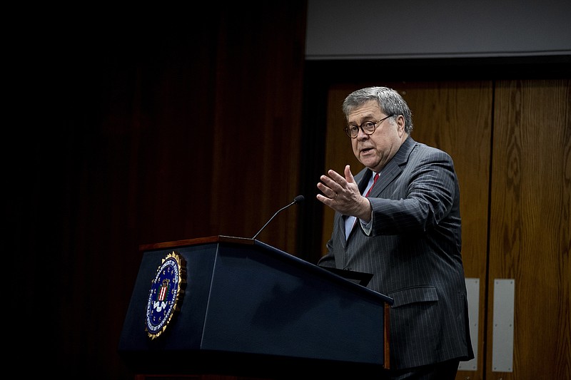 File Photo by Anna Moneymaker/The New York Times / Attorney General William Barr speaks at a Department of Justice workshop at the FBI headquarters in Washington on Feb. 19, 2020.