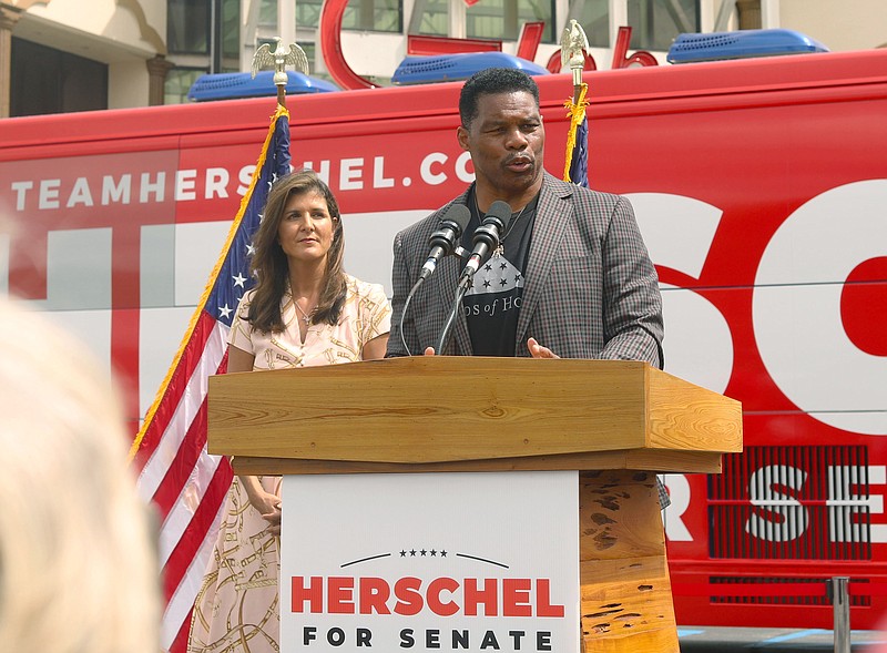 Ace Anderson/ Fresh Take Georgia / Republican U.S. Senate candidate Herschel Walker spoke candidly about his beliefs on controversial issues, including transgender identities, at a Gwinnett County rally outside Atlanta on Friday, Sept. 10, 2022, with former United Nations Ambassador Nikki Haley.