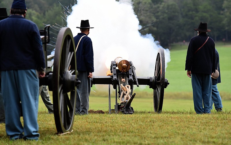 Staff Photo by Matt Hamilton /Park volunteers fire a 12-pound howitzer on Sept. 18, 2021, during artillery demonstrations for the 158th anniversary of the Battle of Chickamauga. This year's artillery demonstrations are scheduled in Winfrey Field at the Chickamauga Battlefield at 10:30 and 11:30 a.m. and 1:30 and 2:30 p.m. Sunday, Sept. 18. Other programs commemorating the 159th anniversary of the Civil War battle continues through Tuesday, Sept. 20.