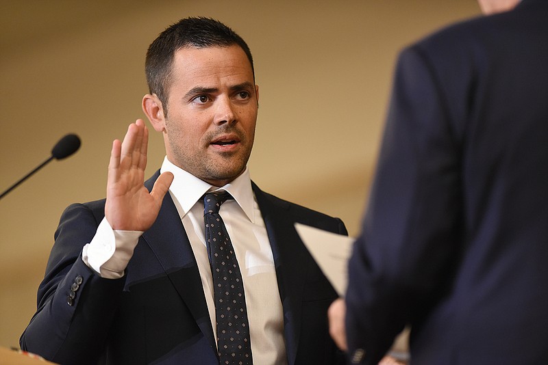 Staff photo by Matt Hamilton / Sen. Todd Gardenhire swears in Weston Wamp as Hamilton County Mayor during the Inaugural Ceremony for Hamilton County Officials on Thursday, September 1, 2022 at the Chattanooga Convention Center.