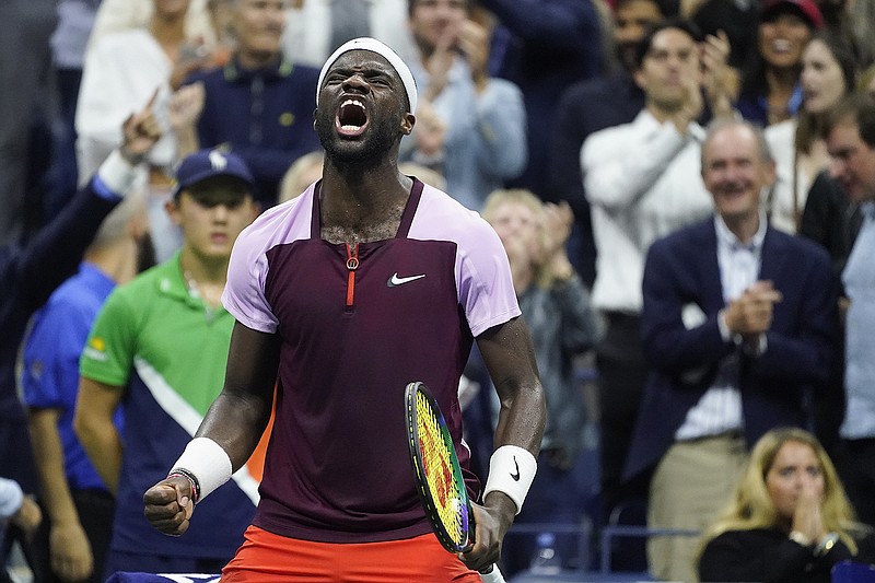 AP Photo/John Minchillo / Frances Tiafoe reacts after winning the fourth set against Carlos Alcaraz during the men’s finals of the U.S. Open.