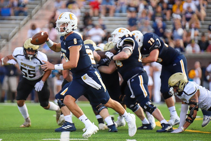 Staff photo by Olivia Ross / UTC quarterback Preston Hutchinson, shown during the Mocs' season-opening win against Wofford on Sept. 3, has completed 62% of his passes through two games.