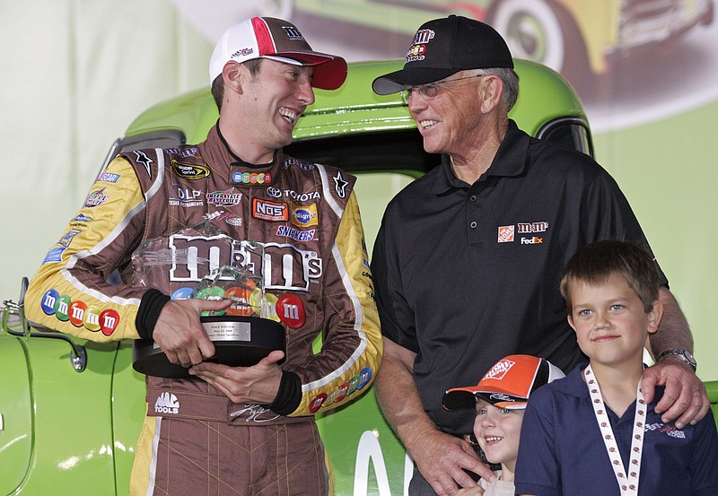 AP file photo by Terry Renna / NASCAR driver Kyle Busch, left, and team owner Joe Gibbs, right, are now in the final days of their partnership after Busch announced he will leave Joe Gibbs Racing and the No. 18 Toyota next year to drive the No. 8 Chevrolet for Richard Childress Racing.