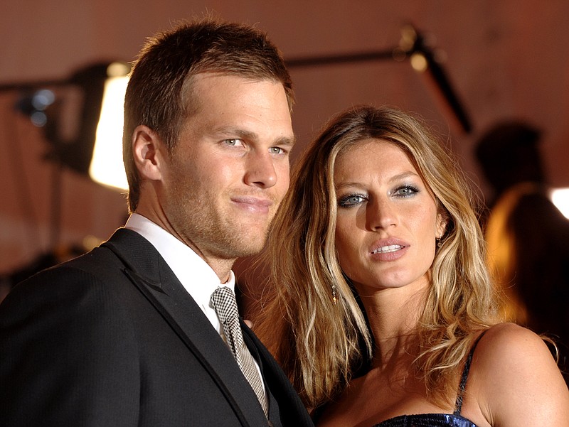 Tom Brady, left, and Gisele Bundchen are reportedly living separately as rumors continue to swirl that they are dealing with marital issues. / AP Photo/Peter Kramer, File, 2009