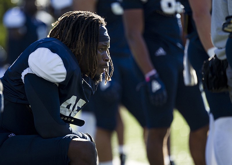 Staff file photo / UTC defensive lineman John Prince, shown during a September 2020 practice, said after the deaths of his grandfather and aunt during the COVID-19 pandemic, he put his emotions regarding the loss of family members toward football and that has helped him "manage it better."