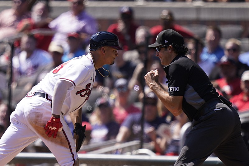 AP photo by Brynn Anderson / First base umpire John Tumpane calls the Atlanta Braves' Vaughn Grissom out on a double play in the fifth inning of Wednesday's game against the visiting Washington Nationals.