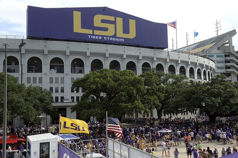 NCAA puts LSU football program on probation for exassistant’s conduct