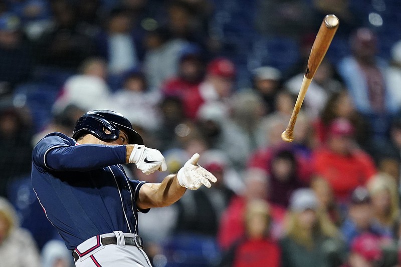 AP photo by Matt Slocum / Atlanta Braves first baseman Matt Olson loses his bat during the sixth inning of Friday night's game against the host Philadelphia Phillies, who won 9-1.