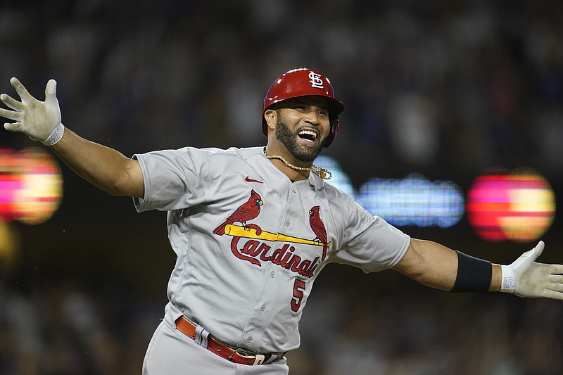 AP photo by Ashley Landis / St. Louis Cardinals designated hitter Albert Pujols celebrates after hitting a home run during the fourth inning of Friday's road game against the Los Angeles Dodgers. It was Pujols' 700th career homer.