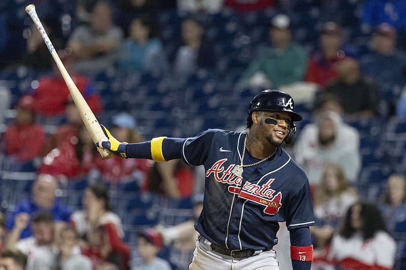 AP photo by Laurence Kesterson / The Atlanta Braves' Ronald Acuña Jr. celebrates after scoring on an RBI single by Michael Harris II during the 11th inning of Sunday's game in Philadelphia. The Braves held on to win 8-7 against the Phillies.