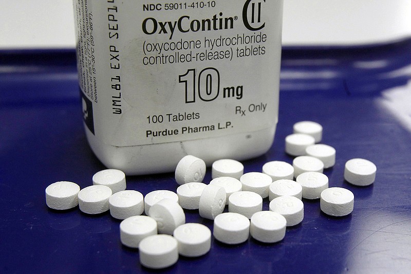 This Feb. 19, 2013, file photo shows OxyContin pills arranged for a photo at a pharmacy in Montpelier, Vt. / AP Photo/Toby Talbot, File