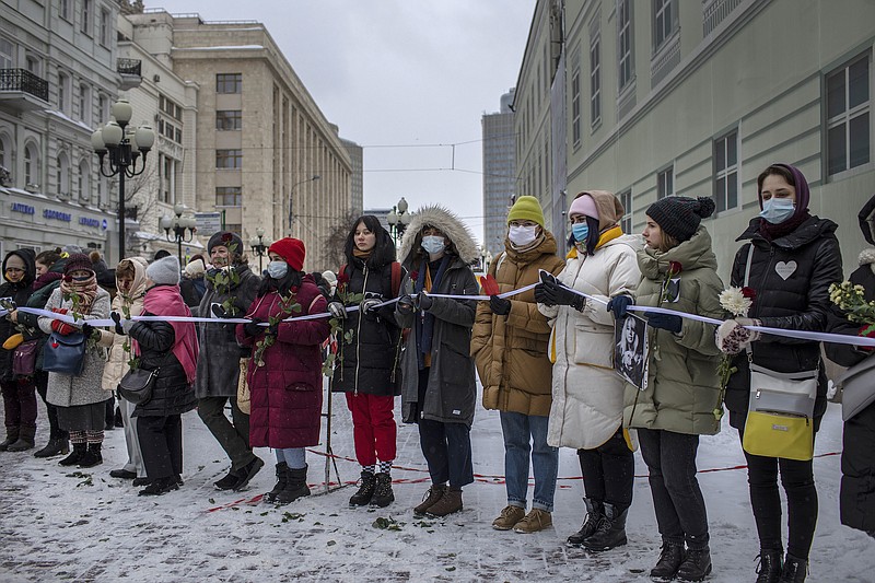 File photo by Emile Ducke / The New York Times / Women attend a rally in support of jailed opposition leader Alexei Navalny and his wife Yulia Navalnaya, in Moscow on Sunday, Feb. 14, 2021.