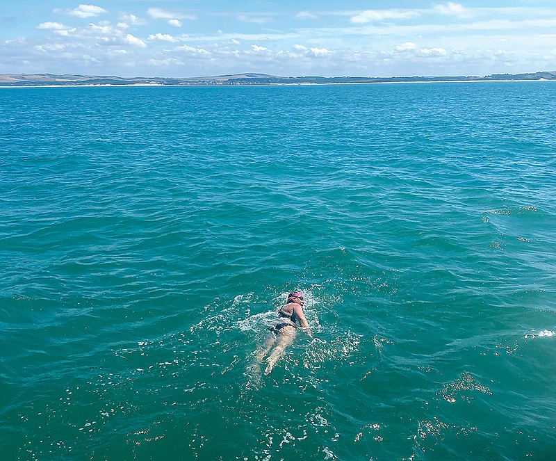Photo contributed by Jenny Smith / Jenny Smith swims the English Channel sans wetsuit, the French coast in sight, during the 2022 Enduroman Arch to Arc Ultratriathlon.