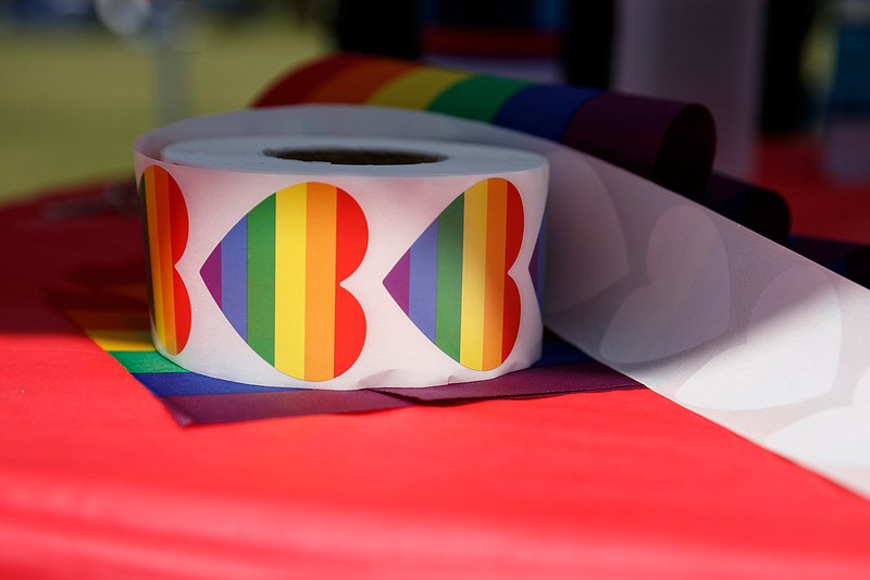 Staff File Photo / Pride stickers are seen during a 2019 Pride Month networking event at Miller Park
