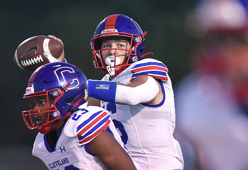 Staff file photo by Matt Hamilton / Cleveland quarterback Drew Lambert, with ball, and the Blue Raiders pulled off a stunner Friday night with their Region 2-6A home win against state power Maryville.