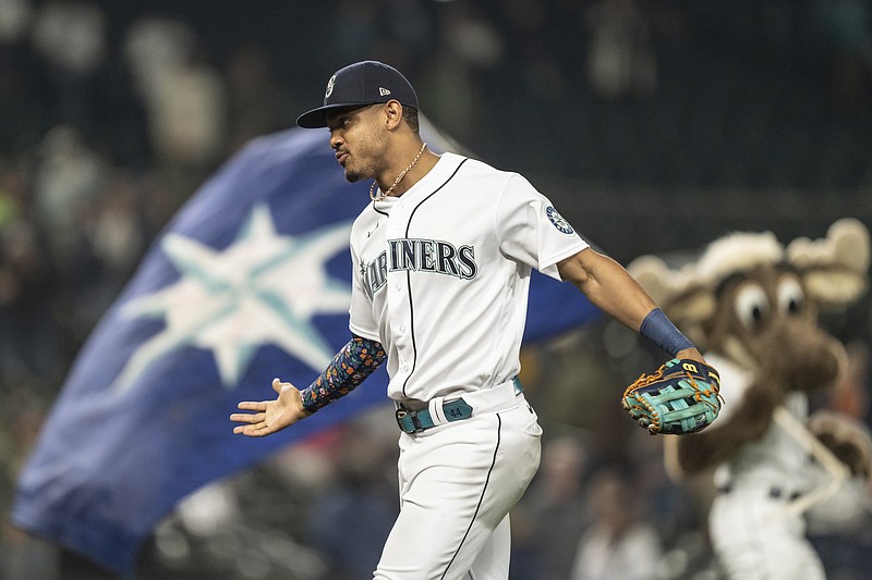 AP file photo by Stephen Brashear / Rookie outfielder Julio Rodríguez has helped the Seattle Mariners earn their first playoff berth since the 2001 season. They visit the Toronto Blue Jays in a best-of-three wild-card series that starts Friday.