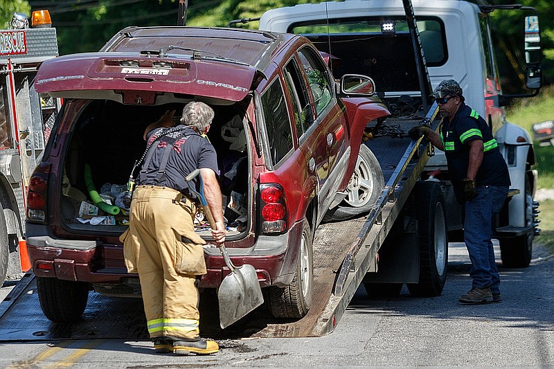 A wrecked Chevrolet Trailblazer is loaded onto a tow truck after a crash on New York Avenue on Wednesday, May 22, 2019, in Chattanooga, Tenn. / Staff photo