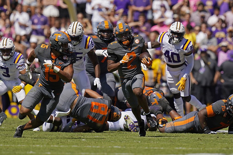 AP photo by Gerald Herbert / Tennessee running back Jabari Small (2) carries for a long gain during the first half of Saturday's SEC matchup of AP Top 25 teams at LSU. Small rushed for 127 yards on 22 carries, including two touchdowns, as the No. 8 Vols beat the No. 25 Tigers 40-13.