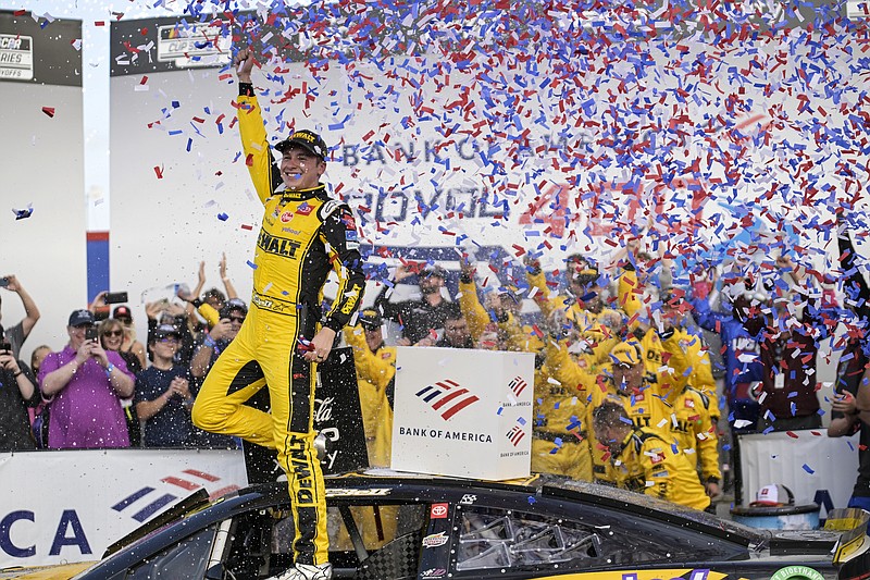 AP photo by Matt Kelley / Joe Gibbs Racing driver Christopher Bell celebrates in victory lane at Charlotte Motor Speedway after winning Sunday's NASCAR Cup Series on the Roval course in Concord, N.C.