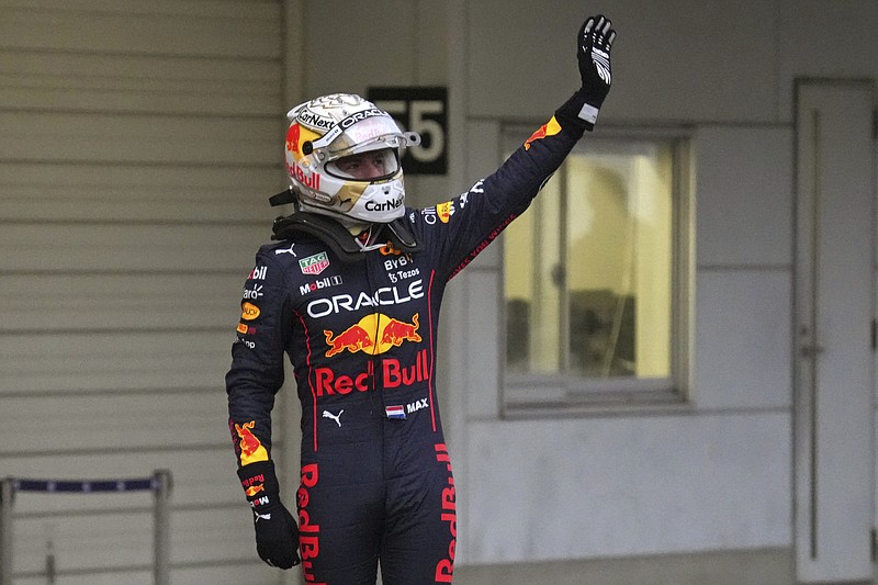 AP photo by Toru Hanai / Red Bull driver Max Verstappen celebrates after winning Sunday's Japanese GP on the Suzuka Circuit to secure his second straight Formula One season championship. He locked up the title with four races still on the 2022 schedule.