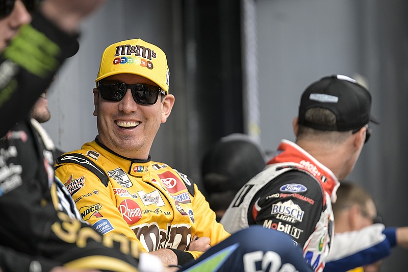 AP photo by Matt Kelley / Joe Gibbs Racing driver Kyle Busch smiles before Sunday's NASCAR Cup Series playoff race at Charlotte Motor Speedway in Concord, N.C. Busch, a two-time Cup Series champion, will move to Richard Childress Racing next season.