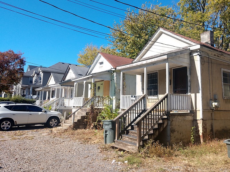 Staff photo by Mike Pare / Old shotgun houses stand in downtown Chattanooga's Southside on East 16th Street in this photo taken Wednesday, Oct. 19, 2022. A developer plans to reuse some of the houses as part of a larger mixed-use project.