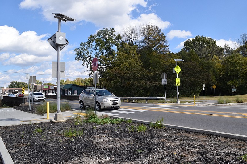 Staff photo by Ben Benton / The crosswalk leading pedestrians and cyclists on the Coops Creek Greenway across Rankin Avenue, shown Thursday, is dangerous, according to residents of Dunlap, Tenn., who hope the crosswalk is part of improvements included in a $14.6 million federal grant.