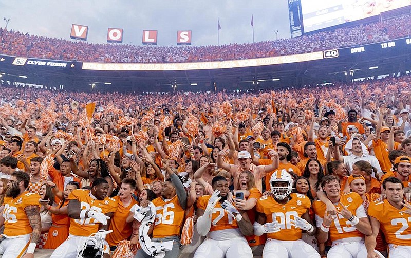 Tennessee Athletics photo by Andrew Ferguson / Tennessee football players celebrate with fans following their 38-33 victory over Florida on Sept. 24. The No. 6 Volunteers are hoping to repeat that scene Saturday afternoon when No. 3 Alabama comes to Knoxville.
