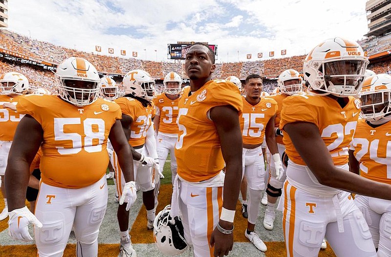 Tennessee Athletics photo by Andrew Ferguson / Tennessee quarterback Hendon Hooker, center, gets ready with his teammates before the Sept. 24 home win over Florida. The No. 6 Vols (5-0, 2-0 SEC) are back at Neyland Stadium for Saturday's 3:30 p.m. game against No. 3 Alabama (6-0, 3-0).