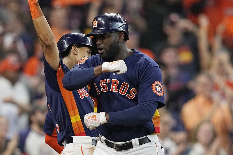 AP photo by David J. Phillip / Houston Astros left fielder Yordan Alvarez celebrates after hitting a two-run homer against the Seattle Mariners in the sixth inning of Game 2 of their AL Division Series on Thursday.