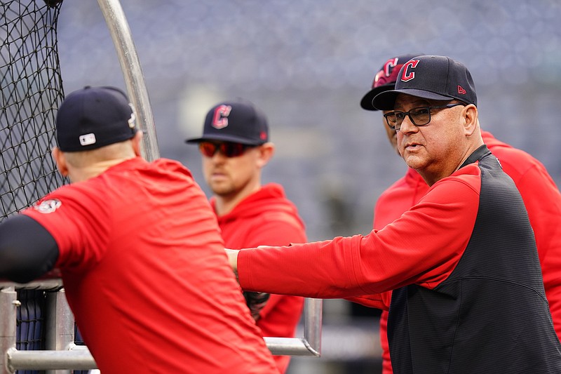 AP photo by Frank Franklin II / Cleveland Guardians manager Terry Francona, right, watches his players work out Wednesday in New York ahead of Game 2 of their AL Division series against the Yankees. The game was postponed from Thursday to Friday because of rain.