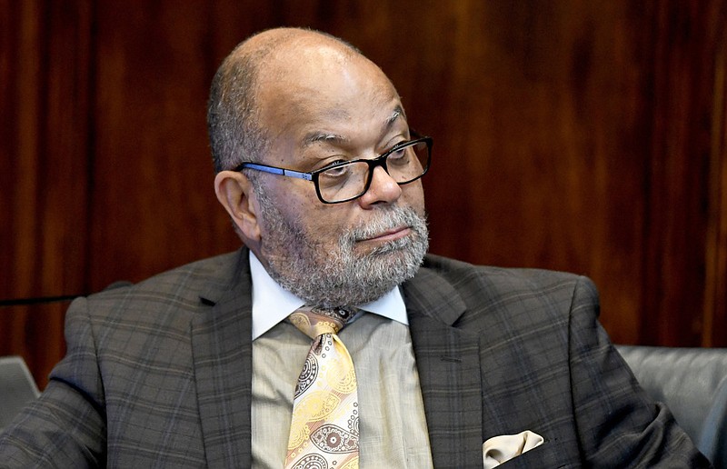 Staff Photo by Robin Rudd /  County Attorney Rheubin Taylor listens to a speaker during the regular meeting of the Hamilton County Commission on September 21, 2022.