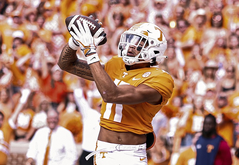 AP photo by Wade Payne / Tennessee wide receiver Jalin Hyatt makes a touchdown catch during the first half of Saturday's home win against Alabama. Hyatt totaled five touchdown catches for the day and broke the Vols' single-game record by two.