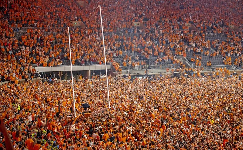 Tennessee Athletics photo by Emma Ramsey / Tennessee football fans tear down a goal post inside Neyland Stadium following Saturday’s 52-49 win over longtime rival Alabama.