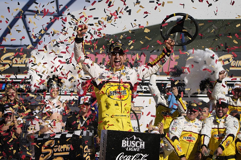 AP photo by John Locher / Team Penske driver Joey Logano celebrates after winning Sunday's NASCAR Cup Series race at Las Vegas Motor Speedway. Logano is the first driver to earn one of the four title-eligible spots in next month's season finale at Phoenix Raceway.
