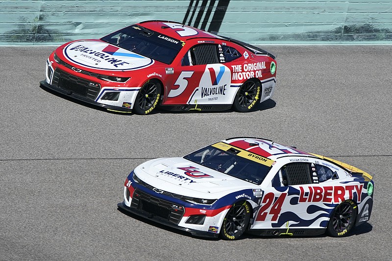 AP photo by Terry Renna / Hendrick Motorsports teammates Kyle Larson (5) and William Byron compete during Sunday's NASCAR Cup Series race at Florida's Homestead-Miami Speedway.